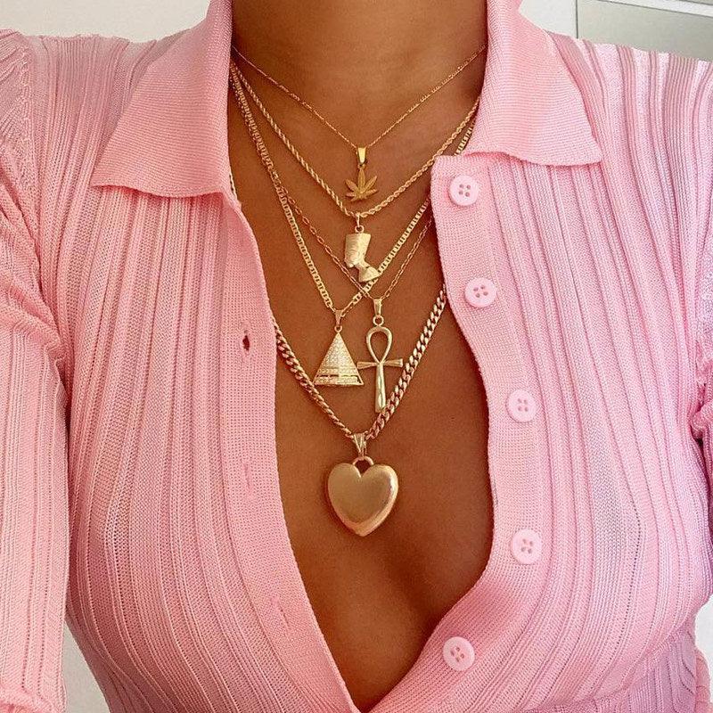 Bohemian Punk Women Leaves Cross Heart Portrait Triangle Pendant Multilayer Gold Necklace Set Fashion Necklace for Women Jewelry in  at Haute for the Culture